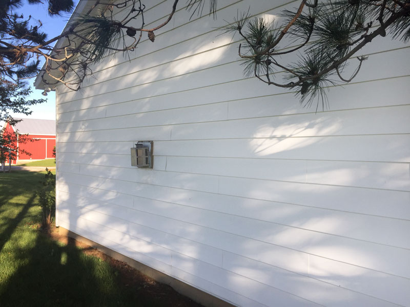 tree frog softwash house washing job after we soft wash the vinyl siding